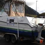 The Tongass Mist, a fully electrified custom-built boat, was one of the many vehicles parked at Juneaus EV & E-bike Roundup downtown Saturday afternoon. (Clarise Larson / Juneau Empire)