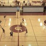A Ketchikan High School volleyball player, at left, unsuccessfully tries to hit the ball over the net, giving Juneau-Douglas High School: Yadaa.at Kalé the decisive winning point in a game Saturday during the Southeast Super Slamma Jamma Volleyball Tournament in Sitka. JDHS, after winning the opening game of the lower-ranking Coho Division in Saturdays tournament, lost the division championship game to Homer High School in straight sets. (Screenshot from Mount Edgecumbe High School video of tournament)