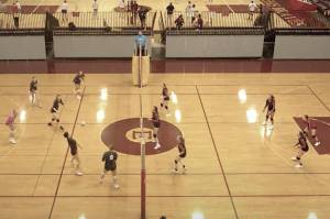 A Ketchikan High School volleyball player, at left, unsuccessfully tries to hit the ball over the net, giving Juneau-Douglas High School: Yadaa.at Kalé the decisive winning point in a game Saturday during the Southeast Super Slamma Jamma Volleyball Tournament in Sitka. JDHS, after winning the opening game of the lower-ranking Coho Division in Saturdays tournament, lost the division championship game to Homer High School in straight sets. (Screenshot from Mount Edgecumbe High School video of tournament)