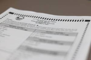 This is a photo of a sample ballot for the 2023 City and Borough of Juneau municipal election. (Clarise Larson / Juneau Empire File)