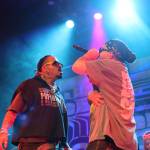 Snotty Nose Rez Kids rappers Yung Trybez and Young D sing to the crowd during a performance as part of the final night of the Áakw Rock music festival at Centennial Hall Saturday evening. (Clarise Larson / Juneau Empire)