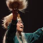 Marie Mead performs a traditional dance during the Inuit-soul musical group PAMYUA!s performance as part of the final night of the Áakw Rock music festival at Centennial Hall Saturday evening. (Clarise Larson / Juneau Empire)