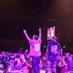 Snotty Nose Rez Kids rappers Yung Trybez and Young D sing to the crowd during a performance as part of the final night of the Áakw Rock music festival at Centennial Hall Saturday evening. (Clarise Larson / Juneau Empire)