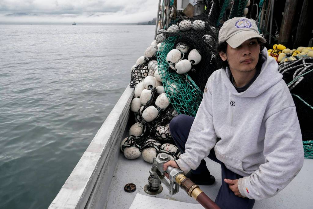 Juan Zuniga, a first-year deckhand on the Agnes Sabine, refuels the boat, Friday, June 23, 2023, in Kodiak, Alaska. For some young people who make the move to Alaskas coasts, the industry is a way to make quick money, but not a forever job. This is a pretty far place from where I live, Zuniga said. Its a very big step out of my comfort zone. (AP Photo/Joshua A. Bickel)