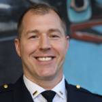 Lt. Krag Campbell with the Juneau Police Department smiles for a photo Tuesday evening outside of City Hall. Campbell is one of two finalists seeking the chief position at the department. (Clarise Larson / Juneau Empire)