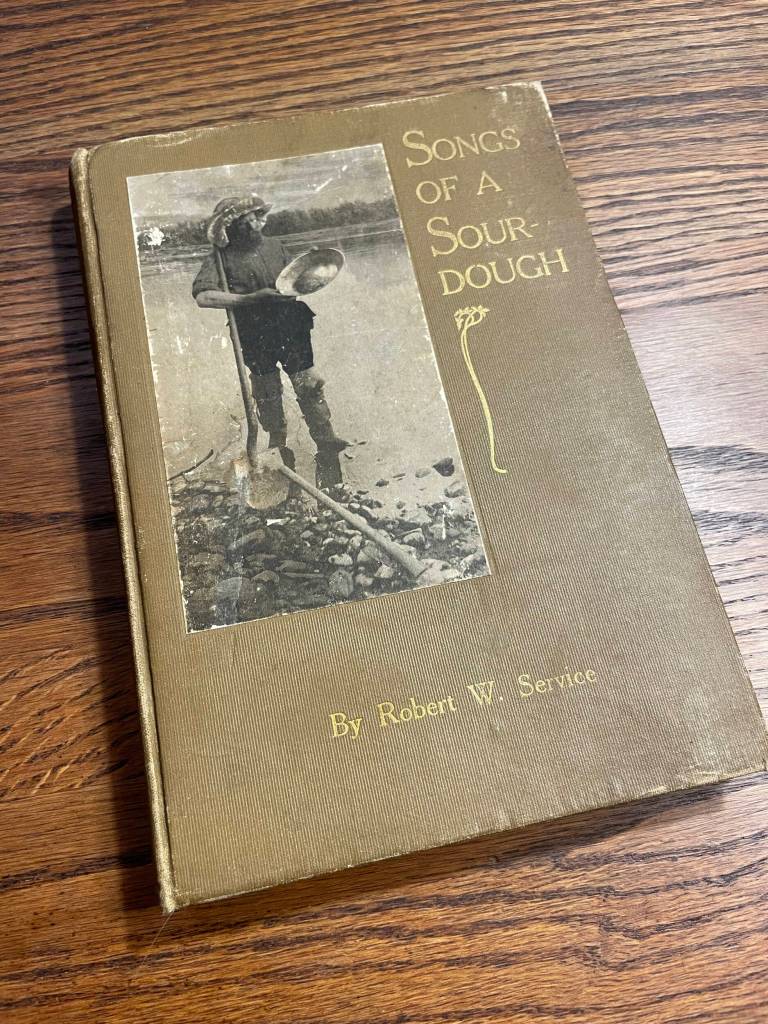 The cover Robert Service poetry book Songs of A Sourdough published in 1908. Fourteenth edition. (Photo by Laurie Craig)