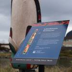 New signs were placed this week to accompany the 12 totem poles raised along Juneaus downtown waterfront. (Clarise Larson / Juneau Empire)