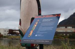New signs were placed this week to accompany the 12 totem poles raised along Juneaus downtown waterfront. (Clarise Larson / Juneau Empire)