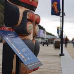 New signs were placed this week to accompany the 12 totem poles raised along Juneaus downtown waterfront. (Clarise Larson / Juneau Empire)