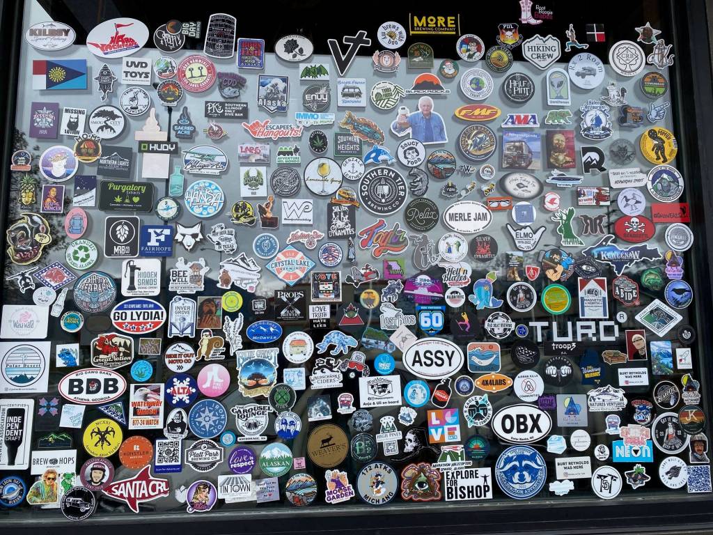 Pins, medals and buttons from everywhere in downtown Seward on Sept. 20. (Photo by Denise Carroll)