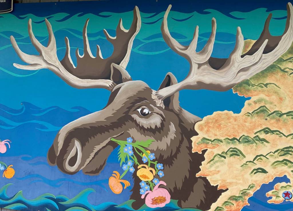 A happy moose head on the side of a downtown building in downtown Seward on Sept. 20. (Photo by Denise Carroll)
