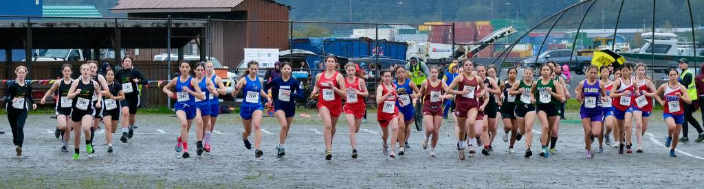Runners start the Division III Region V Girls Cross Country Championship race on Saturday at Treadwell Mine Trails. (Klas Stolpe / For the Juneau Empire)