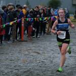 Thunder Mountain sophomore Della Mearig sprints to the finish of the Division I Region V Girls Cross Country Championship race on Saturday at Treadwell Mine Trails. (Klas Stolpe / For the Juneau Empire)
