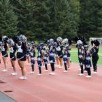 An expanded squad of cheerleaders urges the crowd on just before halftime of the Juneau Huskiess final home game of the season Saturday at Adair-Kennedy Field. (Mark Sabbatini / Juneau Empire)