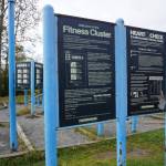 An exercise station at Anchorages Westchester Lagoon is seen on Monday. The Fitness Cluster offers opportunities for strength and cardiovacular training, and signage gives fitness information and advice. Two-thirds of Alaska adults are overweight or obese, and about a fifth of them engage in no physical activity, according to an annual report released by the state Department of Health. (Photo by Yereth Rosen/Alaska Beacon)
