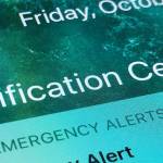 An emergency alert is displayed on a cellphone, Oct. 30, 2020, in Rio Rancho, N.M. (AP Photo/Susan Montoya Bryan, File)