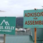 Campaign signs for Areawide Assembly candidates Paul Kelly and Ella Adkison sit side-by-side in a yard on Douglas. Kelly and Adkison are the candidates currently leading in the 10-person field for two open Assembly Areawide seats, according to preliminary results released Wednesday morning. (Clarise Larson / Juneau Empire)