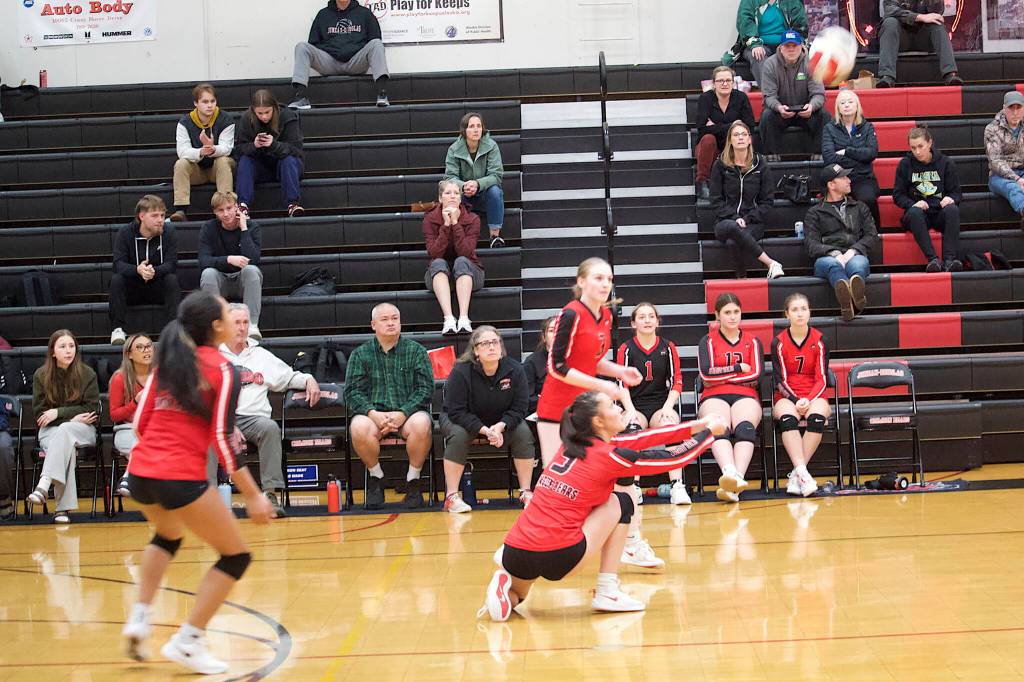 Kiah Yadao (5), a senior, saves the ball for Juneau-Douglas High School: Yadaa.at Kalé during the teams game against Mt. Edgecumbe High School on Thursday night at JDHS. (Mark Sabbatini / Juneau Empire)