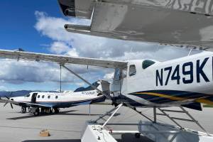 Alaska Seaplanes aircraft sit on the flight line during an event celebrating the companys debut of service to Wrangell on May 26. 2022. The company announced this week it is cancelling service to Wrangell and Petersburg as of Nov. 1. (Michael S. Lockett / Juneau Empire File)