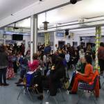 Josie Ferrer addresses the audience with announcements during the Filipino Community Celebration on Saturday. Hundreds of people attended the event on Saturday, with more activities planned starting at noon Sunday. (Meredith Jordan / Juneau Empire)