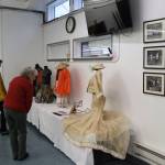 Elissa Borges and Terese Connolly look at costumes on display at the Filipino Community Hall on Saturday. The costumes were part of Alitaptap: A Cultural Serendipity, a performance of folk dances from different areas of the Philippines, which was held at the Juneau-Douglas High School: Yadaa.at Kalé auditorium in 2004. (Meredith Jordan / Juneau Empire)