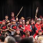 Students from the Tlingit Culture Language and Literacy program sing and dance on stage during a healing event on Indigenous Peoples Day on Monday to acknowledge and accept an apology of the closure of Juneaus Memorial Presbyterian Church in 1962. (Clarise Larson / Juneau Empire)