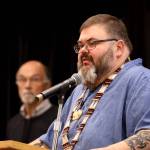 Richard Chalyee Éesh Peterson, president of the Central Council of the Tlingit and Haida Indian Tribes of Alaska, speaks to the crowd on stage during a healing event on Indigenous Peoples Day on Monday to acknowledge and accept an apology of the closure of Juneaus Memorial Presbyterian Church in 1962. (Clarise Larson / Juneau Empire)