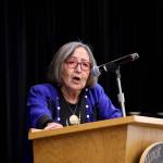 Sealaska Heritage President Rosita Worl speaks to the crowd on stage during a healing event on Indigenous Peoples Day on Monday to acknowledge and accept an apology of the closure of Juneaus Memorial Presbyterian Church in 1962. (Clarise Larson / Juneau Empire)