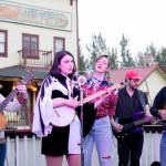 Muskeg Collective members Erin Heist, Annie Bartholomew, Taylor Vidic and Josh Fortenbery, plus special guest Andrew Heist, perform at The Golden Saloon in McCarthy in early August. The group will be featured at the Cowboy Ball on Saturday at the Juneau Arts and Culture Center. (Photo by Cam Jimmo)
