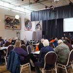 Dozens of residents packed into the Juneau Arts and Culture Center Wednesday evening during an open house to discuss Telephone Hill developments. (Clarise Larson / Juneau Empire)