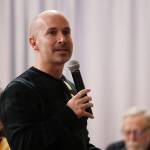 Areawide Assembly candidate Paul Kelly speaks to the crowd gathered at a public meeting to discuss the new design concepts for the Telephone Hill redevelopment project that were presented Wednesday evening at the Juneau Arts and Culture Center. (Clarise Larson / Juneau Empire)