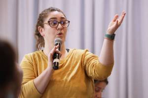 Telephone Hill resident Callie Conerton expresses concerns about the new design concepts for the Telephone Hill redevelopment project that were presented Wednesday evening at the Juneau Arts and Culture Center. She said she is concerned about the affordability of the proposed units. (Clarise Larson / Juneau Empire)