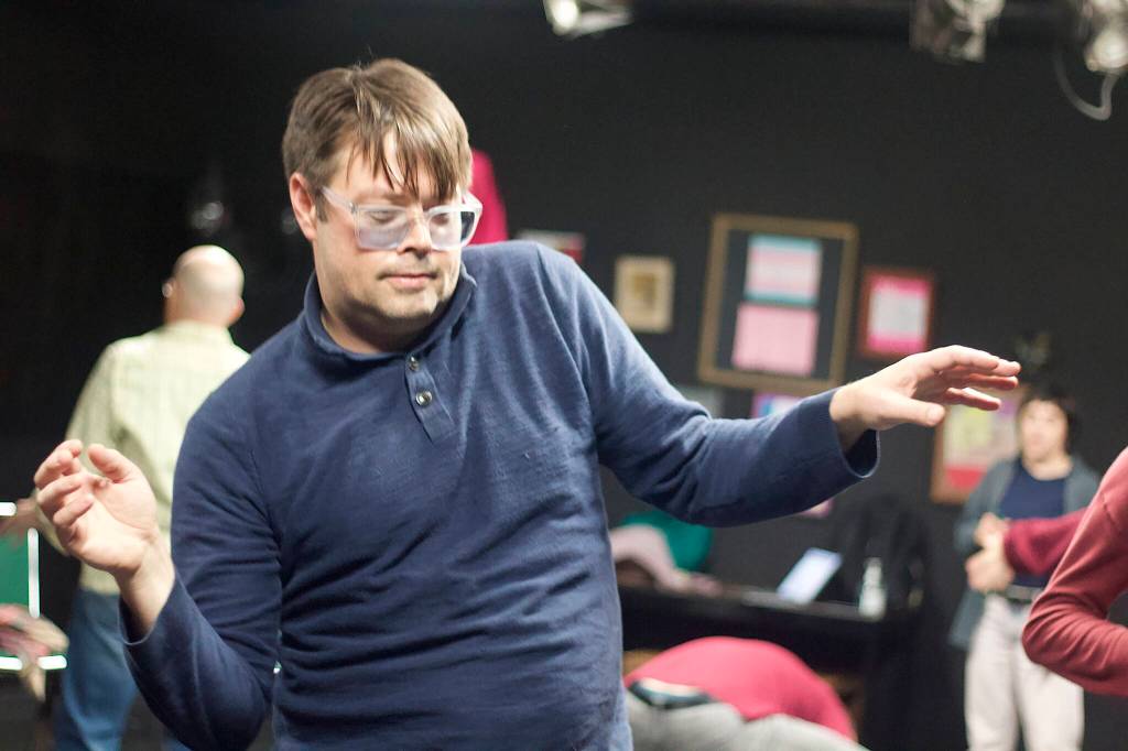 Ganesha Howell, a first-time stage student, dances to music and meditative words by instructor Tallie Medel during a clown class at Perseverance Theatre on Tuesday night. (Mark Sabbatini / Juneau Empire)