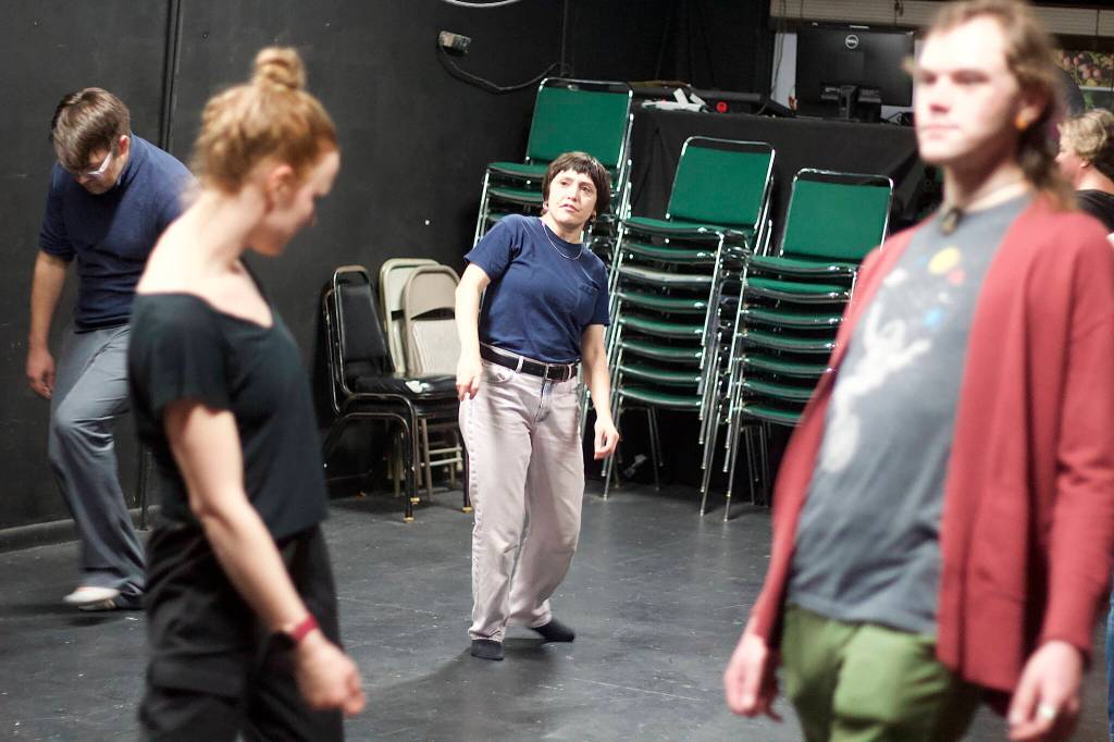 Tallie Medel instructs students how to take a variety of stage steps during a clown class at Perseverance Theatre on Tuesday night. (Mark Sabbatini / Juneau Empire)