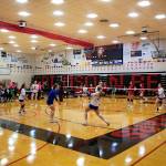 Juneaus two high school volleyball teams face each other on one court while two out-of-town teams play on a second court Saturday afternoon in the Juneau Invitational Volleyball Extravaganza at Juneau-Douglas High School: Yadaa.at Kalé on Saturday. Another gym in the school allowed three games at once to be played during the tournament. (Mark Sabbatini / Juneau Empire)
