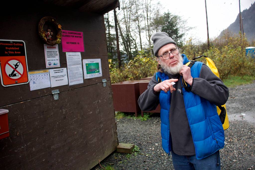 Vernon Ollenberger gets ready to go to his job as a dishwasher on Sunday before spending his last night of the season at Mill Campground before it closed Monday. He said he doesnt know where hell spend Monday night and the following nights until a winter warming shelter opens. (Mark Sabbatini / Juneau Empire)