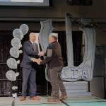 Meredith Jordan/ Juneau Empire
John Blasco, outgoing president of the Greater Juneau Chamber of Commerce, greets Gene Cheeseman of GR Cheeseman Construction, during the chambers annual gala at Centennial Hall. The company is the first recipient of the Business of the Year award for its contribution to saving homes along the Mendenhall River when Suicide Basin flooded in early August.