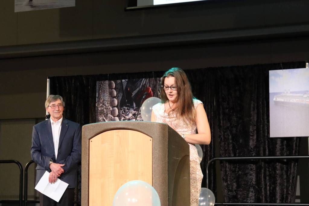 Meredith Jordan/ Juneau Empire
Ami McRae accepts the award for Citizen of the Year on behalf of her mother Leticia McRae during the Greater Juneau Chamber of Commerce annual gala Saturday night at Centennial Hall. The elder McRae was honored for her efforts collecting trash throughout Juneau.