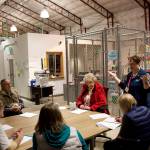 Juneau City Clerk Beth McEwen explains the ballot certification process to election workers Monday at the City and Borough of Juneaus Ballot Processing Center. The results of the Oct. 3 municipal election were certified Tuesday. (Mark Sabbatini / Juneau Empire)