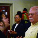 Wayne Stevens, right, president and CEO of United Way of Southeast Alaska, greets a person at the Juneau Chamber of Commerce Luncheon at the Moose Family Lodge on Thursday, Oct. 17, 2019. Stevens retired as head of the organization last month, but remains active in its causes. (Peter Segall / Juneau Empire File)