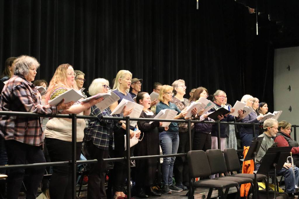 The concert version of Candide, a collaboration of Juneau Symphony and Juneau Lyric Opera to be staged this weekend at Juneau-Douglas High School: Yadaa.at Kalé, includes a 40-person chorus. (Meredith Jordan/ Juneau Empire)