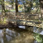 One of two current-day footbridges crossing Jordan Creek constructed of recycled bridge steel. (Photo by Laurie Craig)