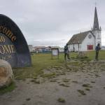Nomes Anvil City Square, with a giant gold pan and statues of the Three Lucky Swedes whose discovery kicked off the 1899 Gold Rush, is seen on Sept. 5, 2021. (Photo by Yereth Rosen/Alaska Beacon)