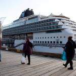 Passengers return to the Norwegian Sun cruise ship early Wednesday evening, the final ship to visit Juneau this year. (Mark Sabbatini / Juneau Empire)