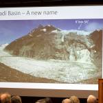 University of Alaska environmental science professor Eran Hood (foreground right) and National Weather Service Juneau hydrologist Aaron Jacobs discuss their hope of renaming Suicide Basin to Kʼóox Ḵaadí Basin, a Tlingit name referring to a small weasel-like mammal in the area  during a presentation Friday at the University of Alaska Southeast. They also discussed the basins history, a record flood from it that occurred this summer and the possibility of future such floods. (Mark Sabbatini / Juneau Empire)