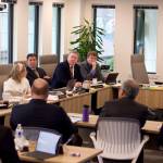 Alaska Permanent Fund Corp. board members, staff and advisors meet Monday at the corporations headquarters in Juneau to discuss a proposal to raise the funds rate of return by making riskier investments. The idea stalled when advisors suggested the strategy and timing are ill-advised. (Mark Sabbatini / Juneau Empire).