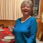 The author hosting a Christmas dinner for her family in 2022. (Photo courtesy of Patty Schied)