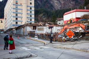 Only a portion of the first floor of the historic Elks Lodge at 109 S. Franklin St. remains standing amidst debris and heavy equipment on Thursday afternoon due to ongoing demolition work this week. The buildings owner has told city officials he hopes to build housing at the site, which is adjacent to where he runs a food stall business. (Mark Sabbatini / Juneau Empire)