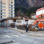Only a portion of the first floor of the historic Elks Lodge at 109 S. Franklin St. remains standing amidst debris and heavy equipment on Thursday afternoon due to ongoing demolition work this week. The buildings owner has told city officials he hopes to build housing at the site, which is adjacent to where he runs a food stall business. (Mark Sabbatini / Juneau Empire)