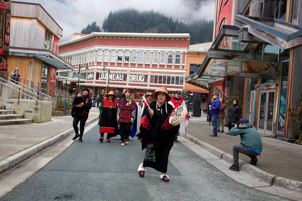The Yées Ḵu.oo Dance Group performs Wednesday on Heritage Way during a ceremony celebrating the steets new name. (Mark Sabbatini / Juneau Empire)